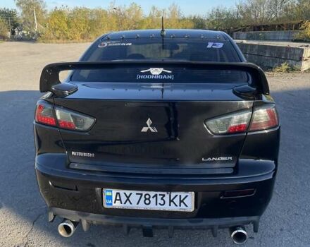Чорний Міцубісі Lancer, об'ємом двигуна 2 л та пробігом 223 тис. км за 7800 $, фото 6 на Automoto.ua
