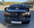 Чорний Міцубісі Lancer, об'ємом двигуна 2 л та пробігом 223 тис. км за 7800 $, фото 6 на Automoto.ua
