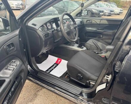 Мицубиси Лансер 2008 в Запорожье на Automoto.ua Черный Мицубиси Лансер, объемом двигателя 1.6 л и пробегом 316 тыс. км за 4290 $, фото 10 на Automoto.ua