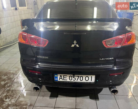 Черный Мицубиси Лансер, объемом двигателя 2 л и пробегом 200 тыс. км за 8000 $, фото 16 на Automoto.ua