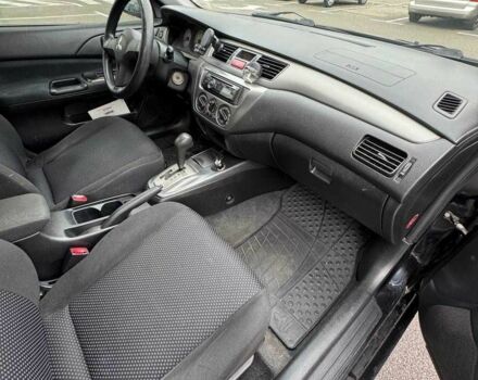 Чорний Міцубісі Lancer, об'ємом двигуна 1.6 л та пробігом 245 тис. км за 4500 $, фото 20 на Automoto.ua