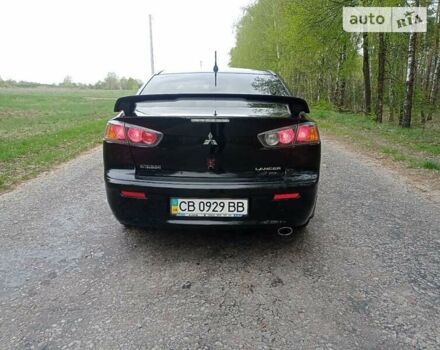 Чорний Міцубісі Lancer, об'ємом двигуна 2 л та пробігом 170 тис. км за 7600 $, фото 6 на Automoto.ua