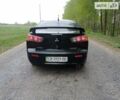 Чорний Міцубісі Lancer, об'ємом двигуна 2 л та пробігом 170 тис. км за 7600 $, фото 6 на Automoto.ua