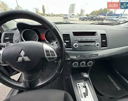 Чорний Міцубісі Lancer, об'ємом двигуна 2 л та пробігом 199 тис. км за 7900 $, фото 29 на Automoto.ua