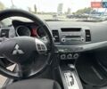 Чорний Міцубісі Lancer, об'ємом двигуна 2 л та пробігом 199 тис. км за 7900 $, фото 29 на Automoto.ua