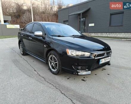 Черный Мицубиси Лансер, объемом двигателя 2 л и пробегом 245 тыс. км за 5600 $, фото 6 на Automoto.ua