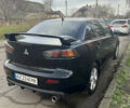 Черный Мицубиси Лансер, объемом двигателя 2 л и пробегом 270 тыс. км за 5400 $, фото 3 на Automoto.ua