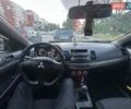 Черный Мицубиси Лансер, объемом двигателя 2 л и пробегом 188 тыс. км за 6900 $, фото 7 на Automoto.ua