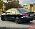 Чорний Міцубісі Lancer, об'ємом двигуна 1.6 л та пробігом 202 тис. км за 5700 $, фото 4 на Automoto.ua