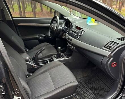 Чорний Міцубісі Lancer, об'ємом двигуна 2 л та пробігом 263 тис. км за 5750 $, фото 7 на Automoto.ua