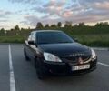 Черный Мицубиси Лансер, объемом двигателя 1.6 л и пробегом 278 тыс. км за 4799 $, фото 1 на Automoto.ua