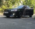 Чорний Міцубісі Lancer, об'ємом двигуна 1.5 л та пробігом 160 тис. км за 7500 $, фото 1 на Automoto.ua