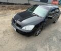 Черный Мицубиси Лансер, объемом двигателя 1.58 л и пробегом 188 тыс. км за 4800 $, фото 1 на Automoto.ua
