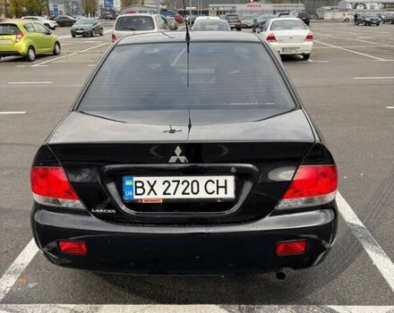 Чорний Міцубісі Lancer, об'ємом двигуна 1.6 л та пробігом 245 тис. км за 4500 $, фото 7 на Automoto.ua