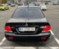 Чорний Міцубісі Lancer, об'ємом двигуна 1.6 л та пробігом 245 тис. км за 4500 $, фото 7 на Automoto.ua