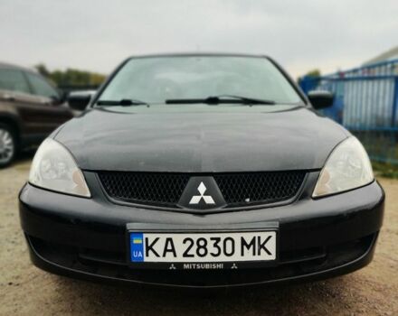 Чорний Міцубісі Lancer, об'ємом двигуна 1.6 л та пробігом 257 тис. км за 4200 $, фото 1 на Automoto.ua