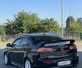 Чорний Міцубісі Lancer, об'ємом двигуна 2 л та пробігом 200 тис. км за 5650 $, фото 5 на Automoto.ua