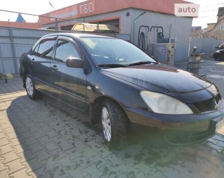 Чорний Міцубісі Lancer, об'ємом двигуна 1.6 л та пробігом 335 тис. км за 3100 $, фото 5 на Automoto.ua