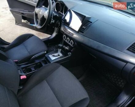 Мицубиси Лансер 2008 в Киеве на Automoto.ua Черный Мицубиси Лансер, объемом двигателя 2 л и пробегом 196 тыс. км за 5500 $, фото 23 на Automoto.ua