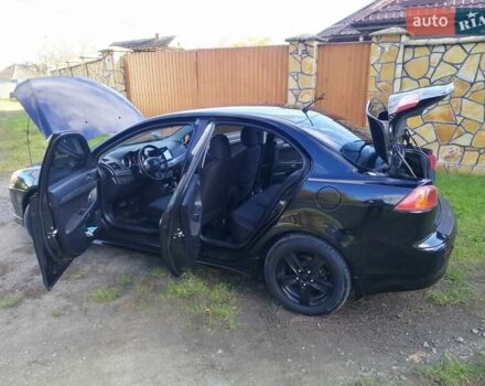 Мицубиси Лансер 2008 в Киеве на Automoto.ua Черный Мицубиси Лансер, объемом двигателя 2 л и пробегом 196 тыс. км за 5500 $, фото 33 на Automoto.ua