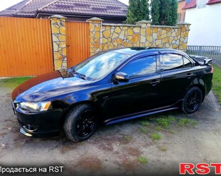 Черный Мицубиси Лансер, объемом двигателя 2 л и пробегом 196 тыс. км за 5500 $, фото 1 на Automoto.ua