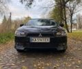 Чорний Міцубісі Lancer, об'ємом двигуна 2 л та пробігом 237 тис. км за 7500 $, фото 12 на Automoto.ua