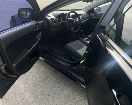 Чорний Міцубісі Lancer, об'ємом двигуна 2 л та пробігом 221 тис. км за 6300 $, фото 5 на Automoto.ua