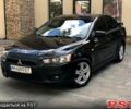 Черный Мицубиси Лансер, объемом двигателя 2 л и пробегом 275 тыс. км за 5400 $, фото 1 на Automoto.ua