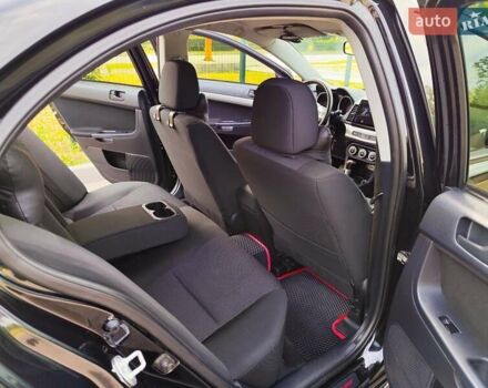 Чорний Міцубісі Lancer, об'ємом двигуна 2 л та пробігом 175 тис. км за 7800 $, фото 12 на Automoto.ua