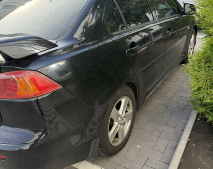 Чорний Міцубісі Lancer, об'ємом двигуна 2 л та пробігом 215 тис. км за 6700 $, фото 3 на Automoto.ua