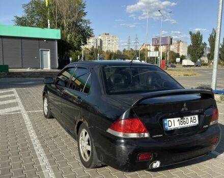 Чорний Міцубісі Lancer, об'ємом двигуна 1.6 л та пробігом 364 тис. км за 3000 $, фото 1 на Automoto.ua