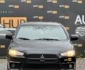 Чорний Міцубісі Lancer, об'ємом двигуна 2 л та пробігом 118 тис. км за 6200 $, фото 2 на Automoto.ua