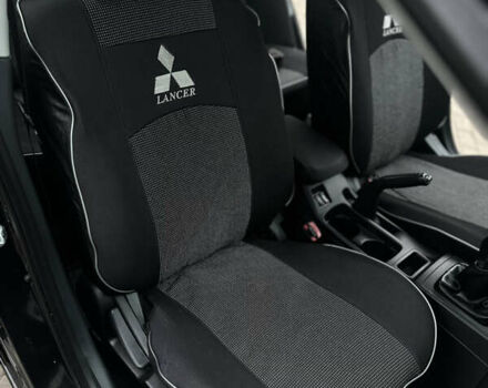 Чорний Міцубісі Lancer, об'ємом двигуна 1.5 л та пробігом 111 тис. км за 6999 $, фото 58 на Automoto.ua