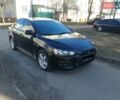 Чорний Міцубісі Lancer, об'ємом двигуна 2 л та пробігом 163 тис. км за 6900 $, фото 1 на Automoto.ua