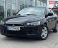 Чорний Міцубісі Lancer, об'ємом двигуна 1.8 л та пробігом 177 тис. км за 6999 $, фото 1 на Automoto.ua
