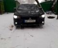 Черный Мицубиси Лансер, объемом двигателя 2 л и пробегом 21 тыс. км за 7300 $, фото 1 на Automoto.ua