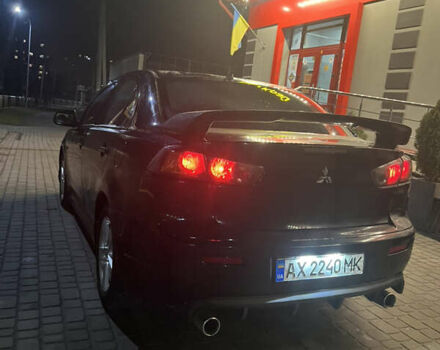 Черный Мицубиси Лансер, объемом двигателя 2 л и пробегом 270 тыс. км за 5400 $, фото 5 на Automoto.ua