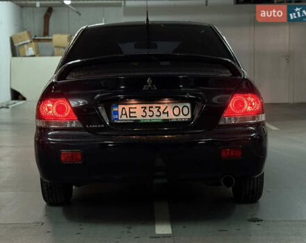 Чорний Міцубісі Lancer, об'ємом двигуна 1.58 л та пробігом 212 тис. км за 5500 $, фото 3 на Automoto.ua