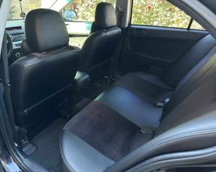 Чорний Міцубісі Lancer, об'ємом двигуна 2 л та пробігом 230 тис. км за 6650 $, фото 13 на Automoto.ua