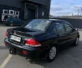 Чорний Міцубісі Lancer, об'ємом двигуна 1.6 л та пробігом 310 тис. км за 3500 $, фото 11 на Automoto.ua