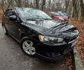 Чорний Міцубісі Lancer, об'ємом двигуна 2 л та пробігом 302 тис. км за 7200 $, фото 1 на Automoto.ua