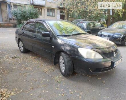 Чорний Міцубісі Lancer, об'ємом двигуна 1.6 л та пробігом 335 тис. км за 3100 $, фото 9 на Automoto.ua