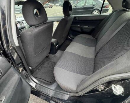 Чорний Міцубісі Lancer, об'ємом двигуна 1.6 л та пробігом 245 тис. км за 4500 $, фото 17 на Automoto.ua