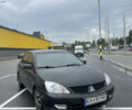 Чорний Міцубісі Lancer, об'ємом двигуна 1.58 л та пробігом 242 тис. км за 5500 $, фото 1 на Automoto.ua
