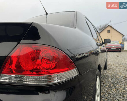 Черный Мицубиси Лансер, объемом двигателя 1.58 л и пробегом 202 тыс. км за 4100 $, фото 18 на Automoto.ua