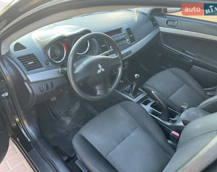 Черный Мицубиси Лансер, объемом двигателя 1.5 л и пробегом 263 тыс. км за 5300 $, фото 9 на Automoto.ua