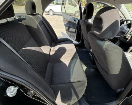 Черный Мицубиси Лансер, объемом двигателя 1.6 л и пробегом 321 тыс. км за 5000 $, фото 24 на Automoto.ua