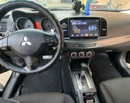 Черный Мицубиси Лансер, объемом двигателя 2 л и пробегом 140 тыс. км за 7200 $, фото 7 на Automoto.ua