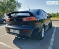 Чорний Міцубісі Lancer, об'ємом двигуна 2 л та пробігом 251 тис. км за 6400 $, фото 7 на Automoto.ua