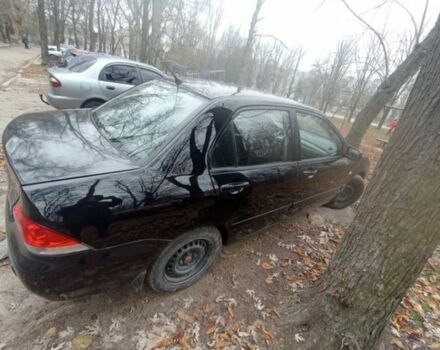 Черный Мицубиси Лансер, объемом двигателя 6 л и пробегом 190 тыс. км за 4500 $, фото 4 на Automoto.ua